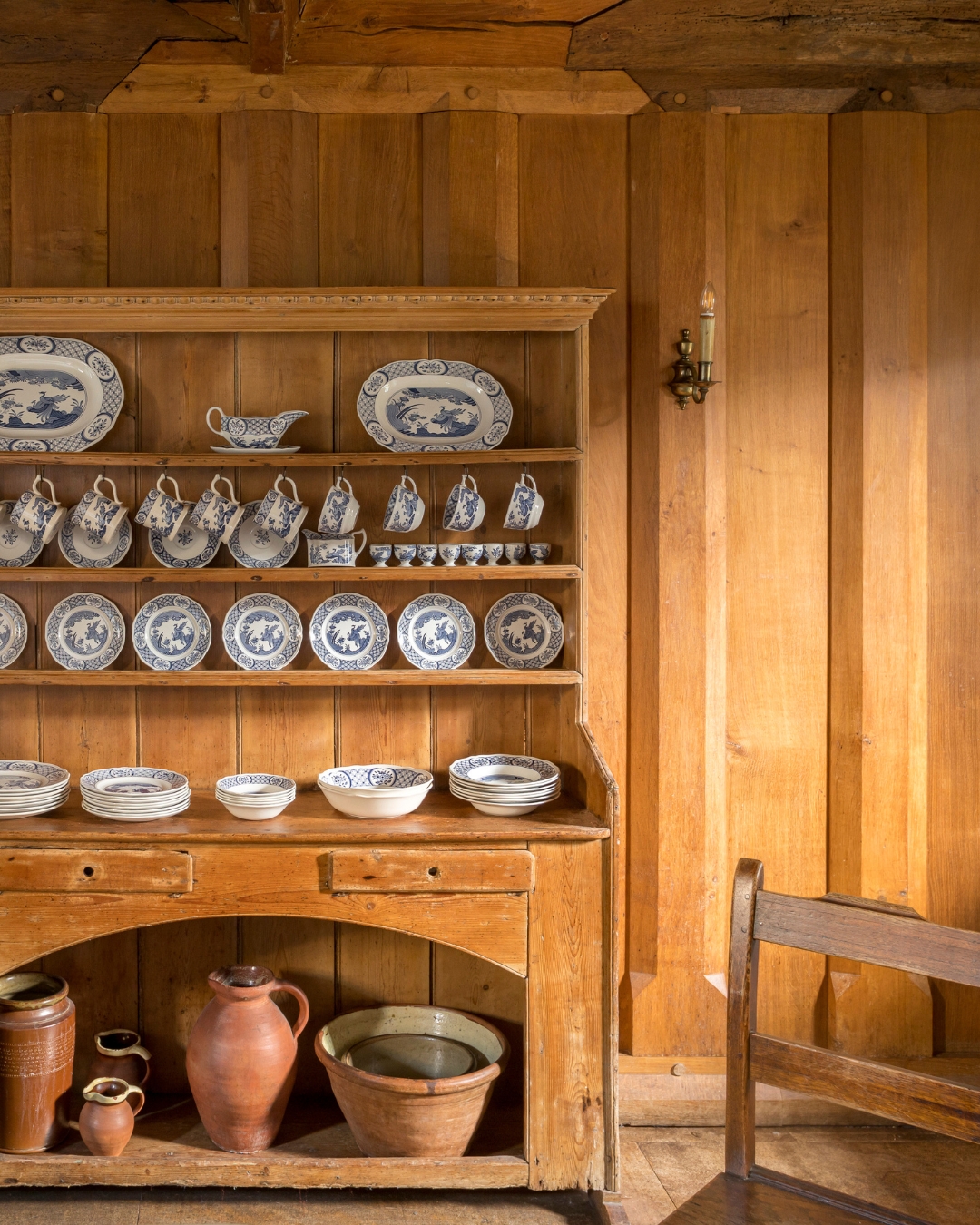 A Welsh dresser stocked with Chelsea China